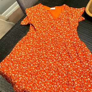 Babydoll dress.  Extra small. Pink lily. Never worn.